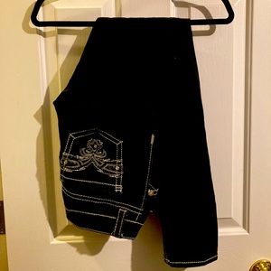 Black, bejeweled skinny jeans.